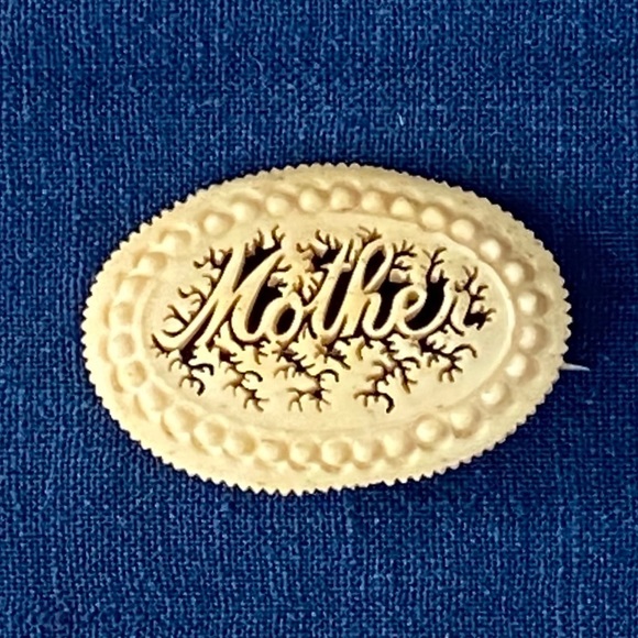 Vintage Jewelry - Vintage Bone Mother Brooch Carved Pierced Pin